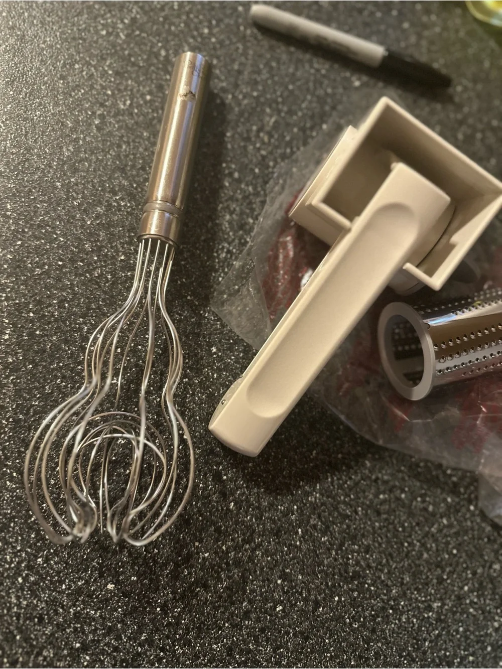 Pampered chef grater and wisk